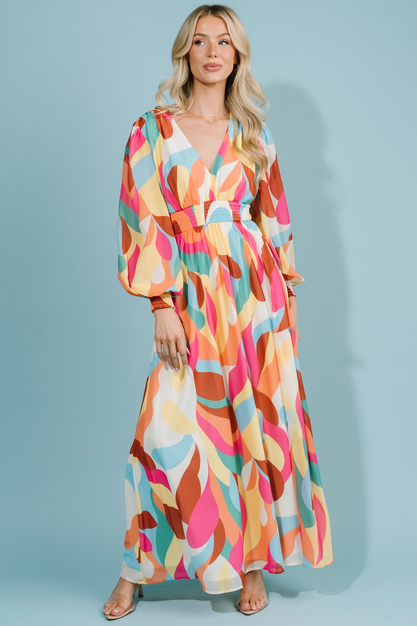 Close-up of the smocked waist and bodice showing texture, stretch, and how the fabric gathers for a comfortable fit.