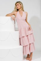 Full-length shot of Savannah Tiered Maxi Dress in light pink, showing silhouette, flowing tiers and ruffled flounce skirt.