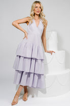 Close-up of the bodice and banded empire waist on the Savannah Tiered Maxi Dress showing fabric texture and seam detail.