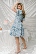 Styled look of the Enchanted Jacquard Dress worn by a model for wedding guest styling, paired with neutral accessories and heels.