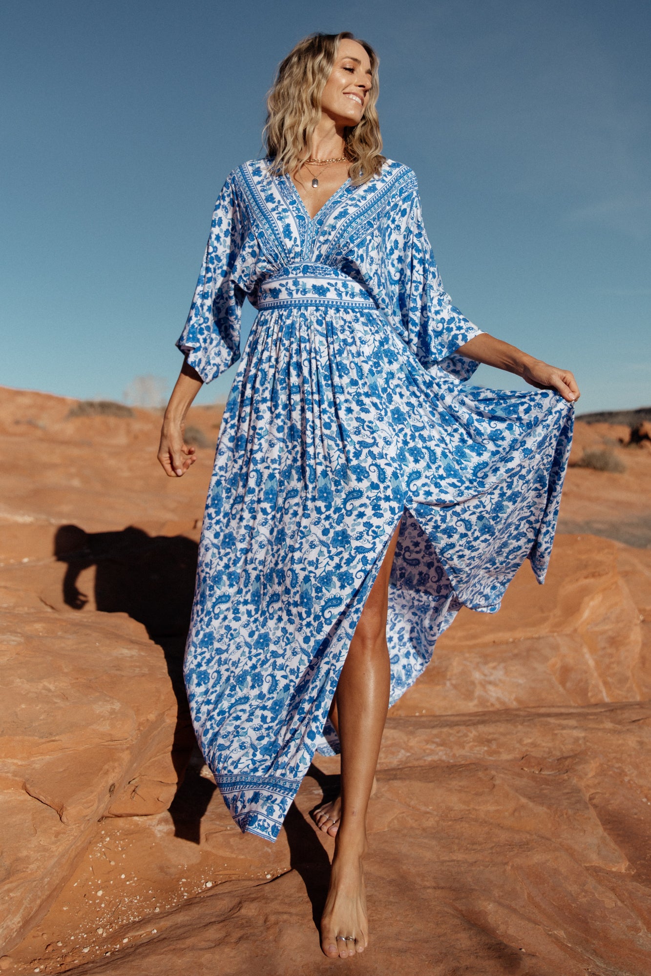 kimono maxi dress Long Sky Blue edocollection Mixed floral print Relaxed fit Split kimono sleeve Maxi length Open back with tassel tie closure Smocked elastic empire waist Silky hand feel Model is 59 Baltic Born Womens Kia Kimono