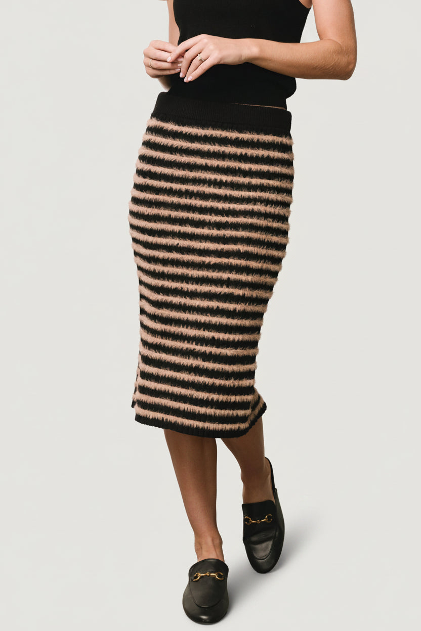 Front view of Mitzi ribbed knit midi skirt in black with fuzzy camel stripes, on a white background showing waistband and silhouette.