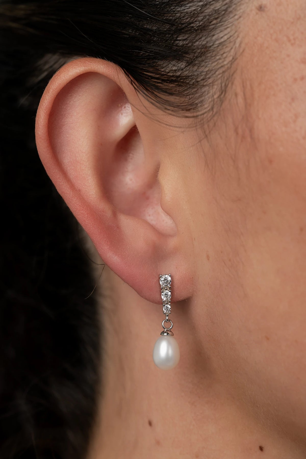 Romona Freshwater Pearl Drop Earrings with luminous pearls and polished sterling silver settings.