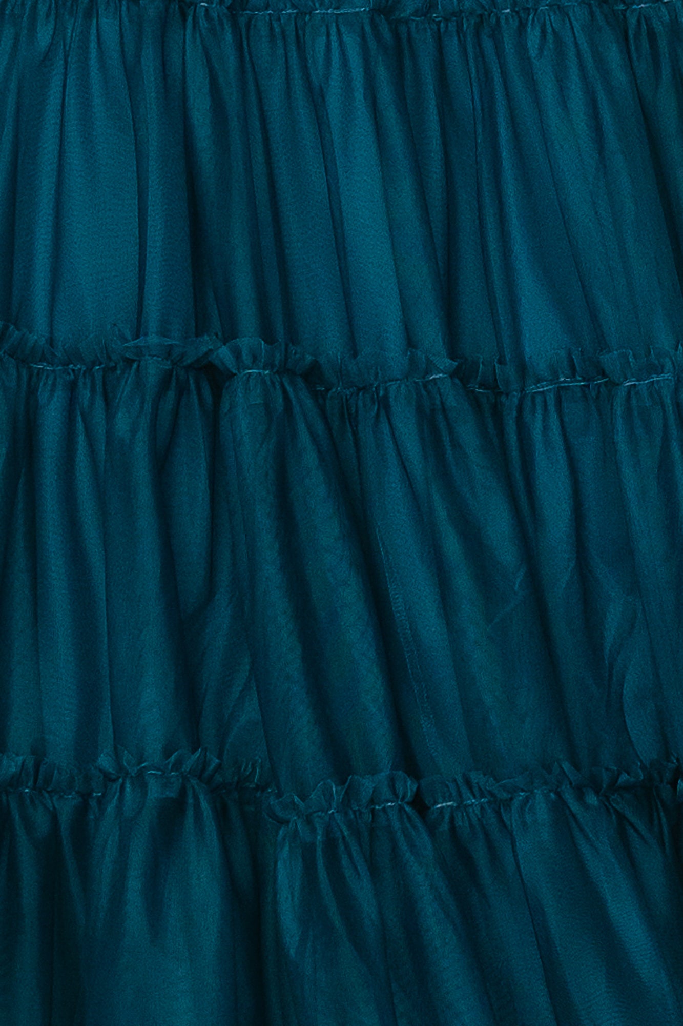 Teal Emma smocked tulle fabric swatch on white background, close-up showing texture and color for matching.