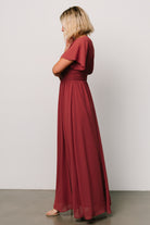 Close-up of the smocked back waist and lightweight chiffon fabric showing texture and gentle ruching details.