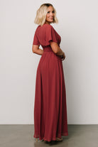 Back view of the Ramona maxi dress in terracotta displaying smocked back waist and fully lined skirt.