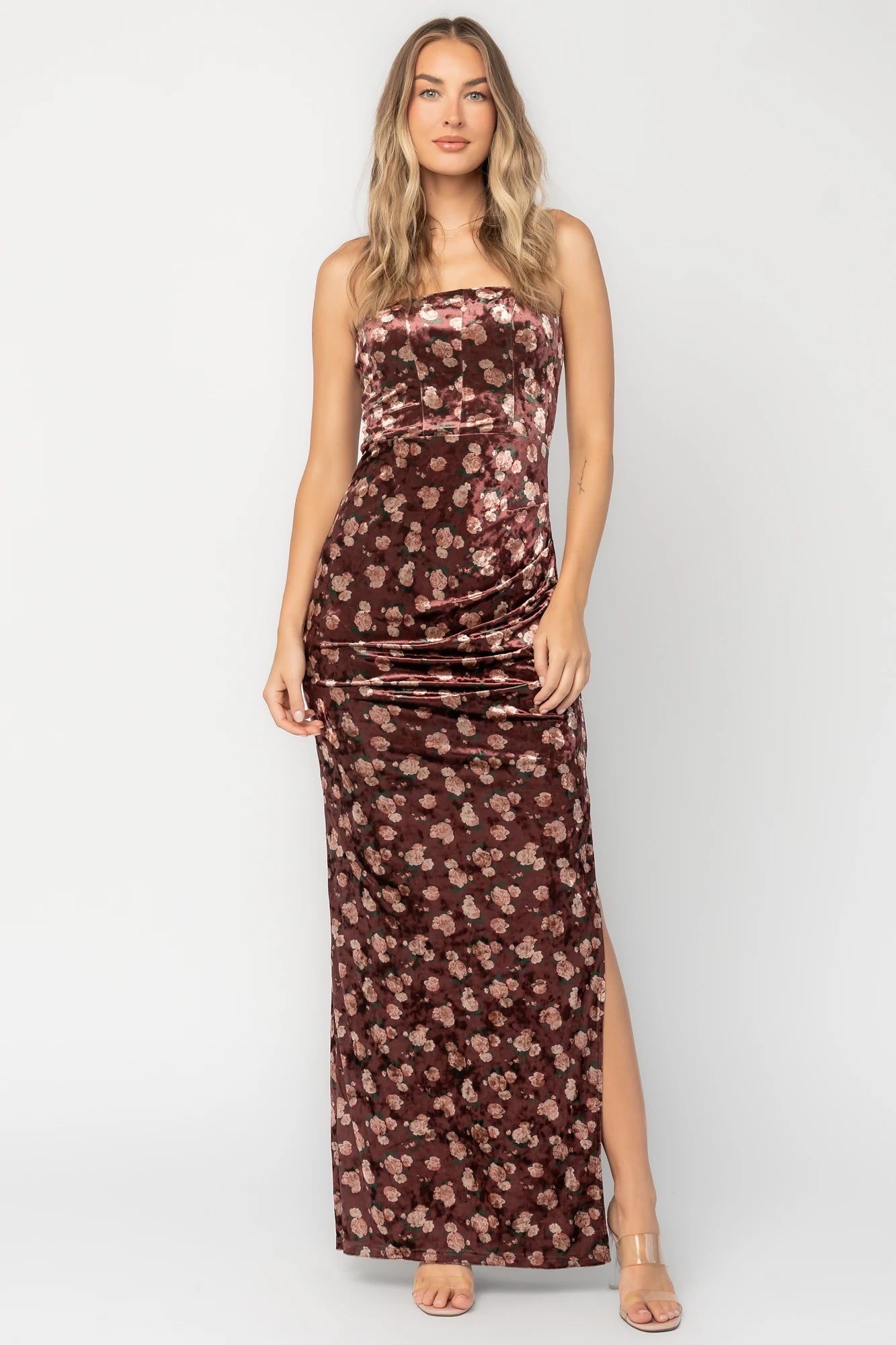 Berry floral velvet strapless maxi dress with side ruching, thigh-high slit, silicone grip neckline, and hidden back zipper.