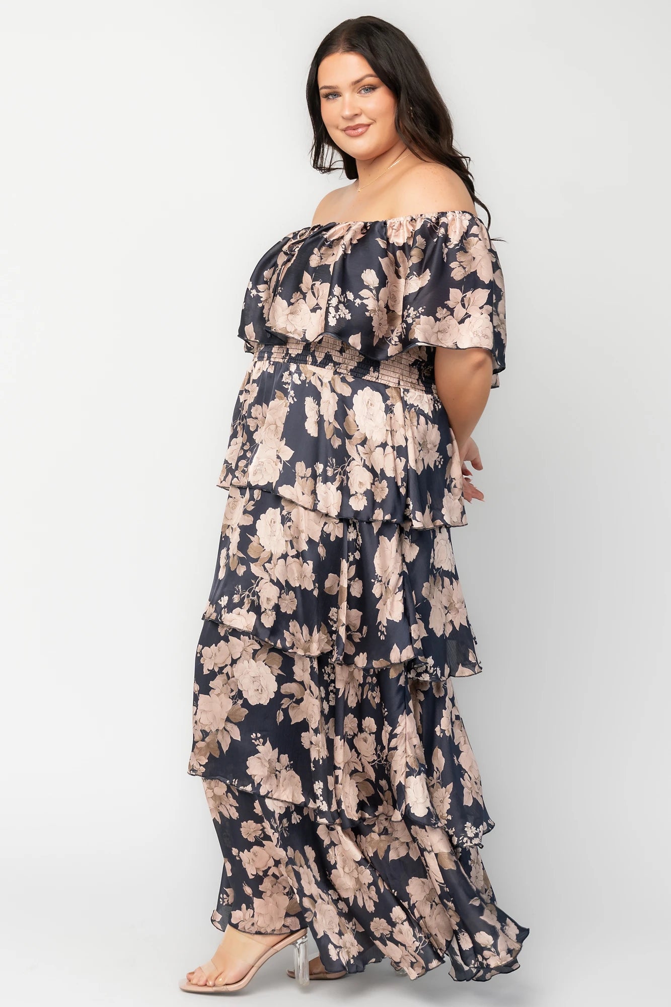 Isabelle Off Shoulder Maxi Dress in Multi Floral with elastic neckline, ruffle bust, smocked waist, and four-tiered skirt.