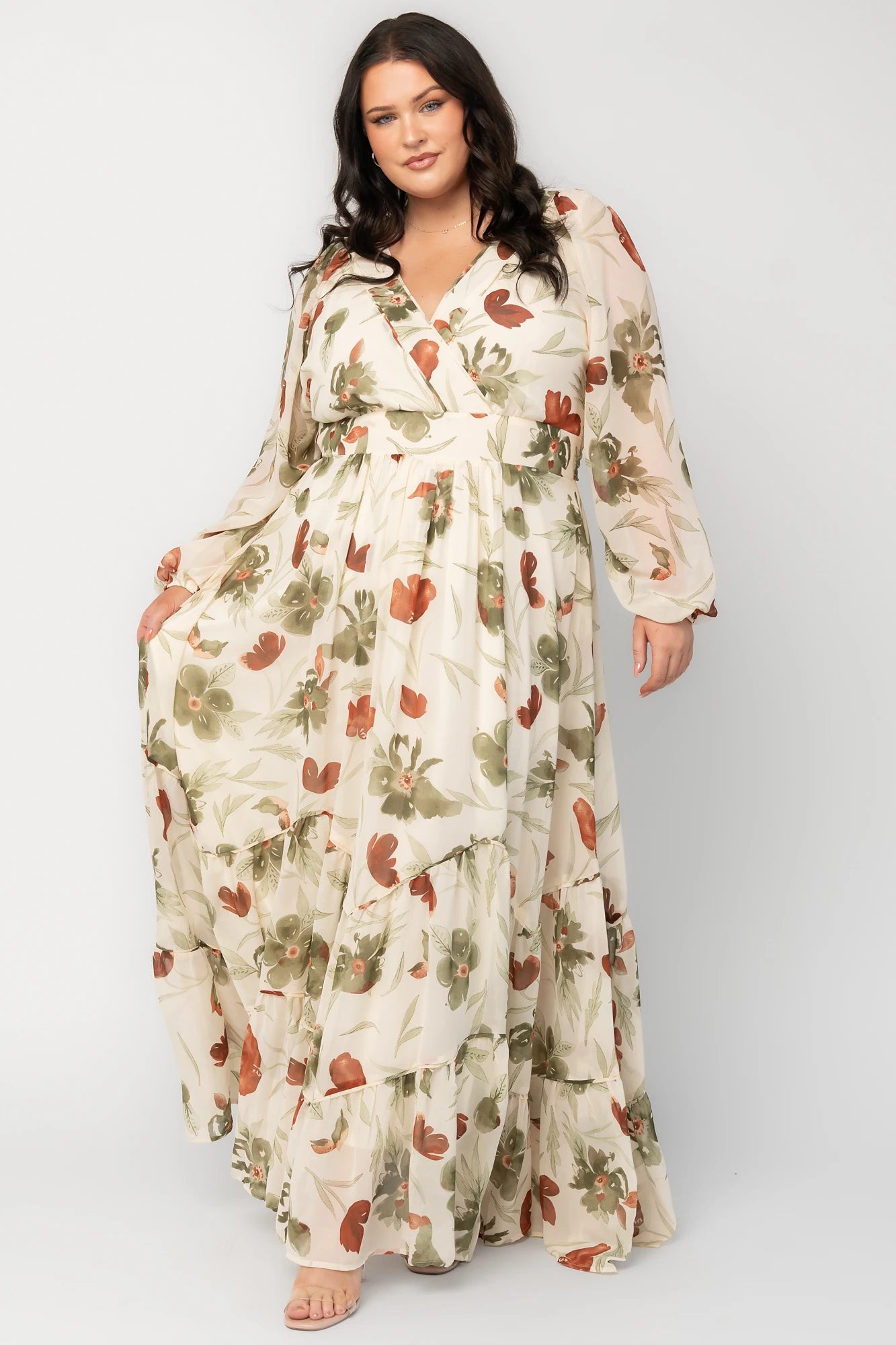 Cream Floral Chiffon Maxi Dress with rust and green florals, surplice neckline, long sleeves, waist ties, and tiered skirt.