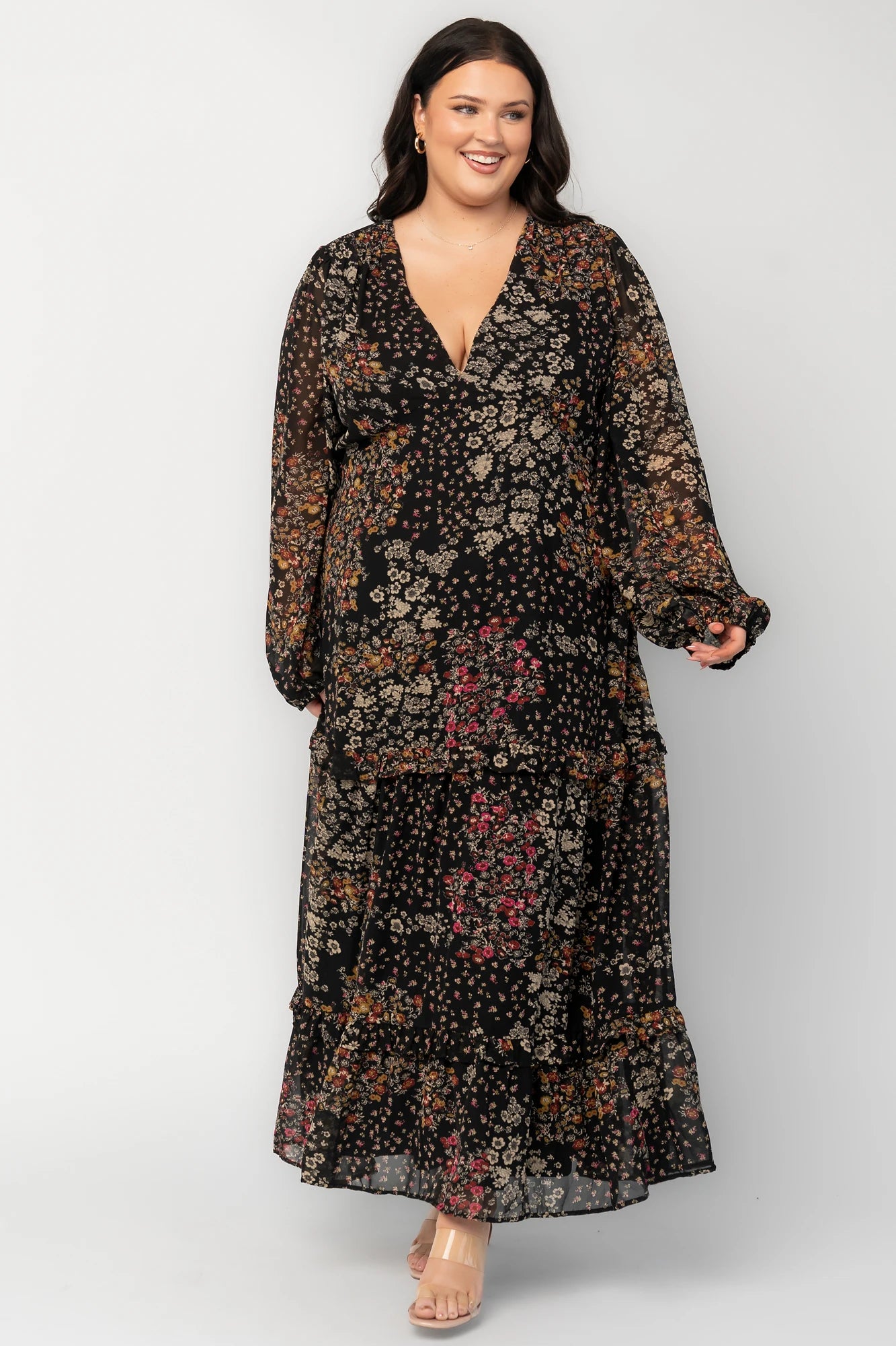 Bowman Deep V Tiered Maxi Dress in Black Multi with deep V-neck, long sleeves, ruffle-tiered skirt, and leg slit.