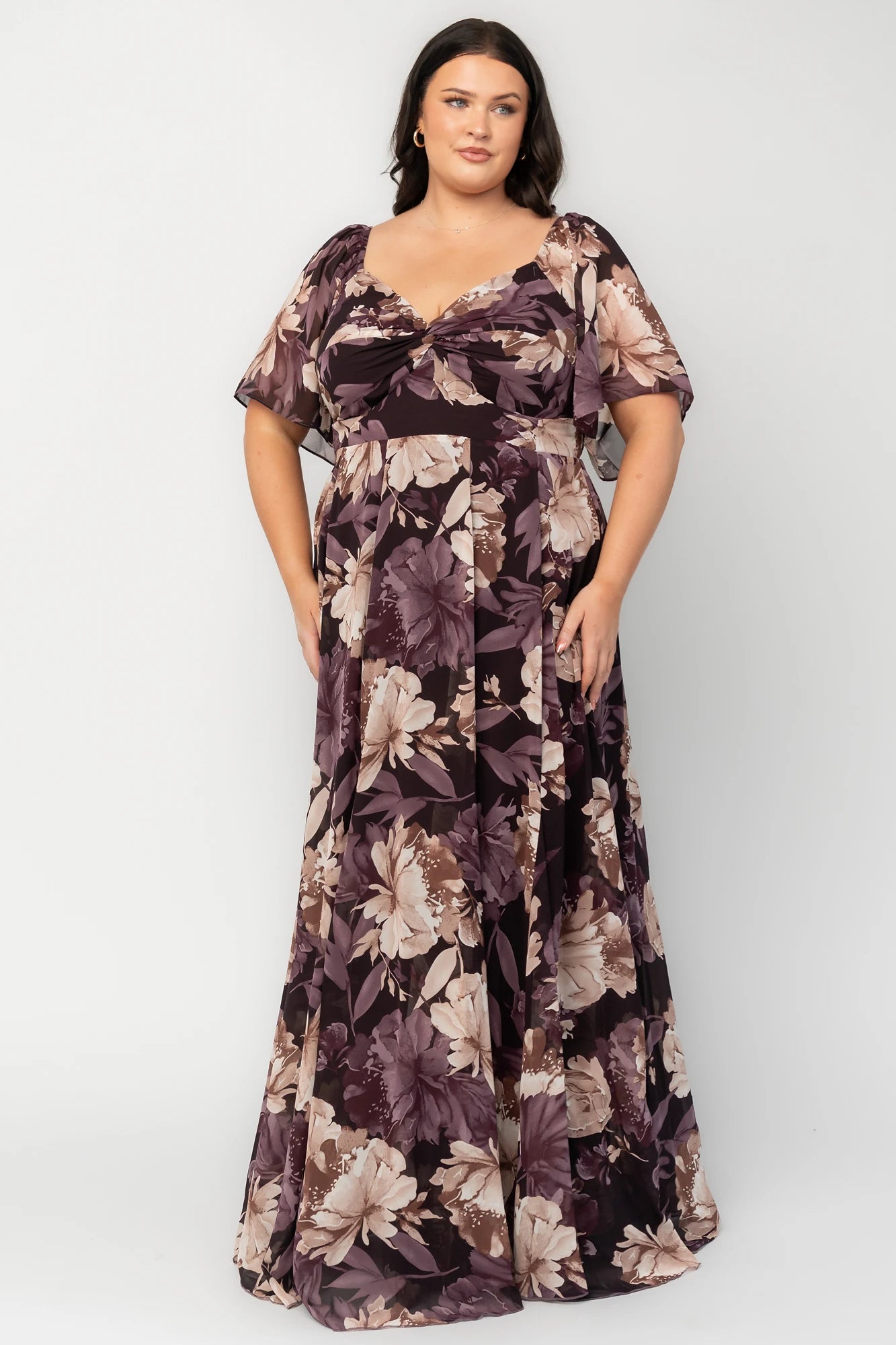 Positano Maxi Dress in Dusty Plum Floral with sweetheart neckline, flutter sleeves, smocked back, and tiered skirt.