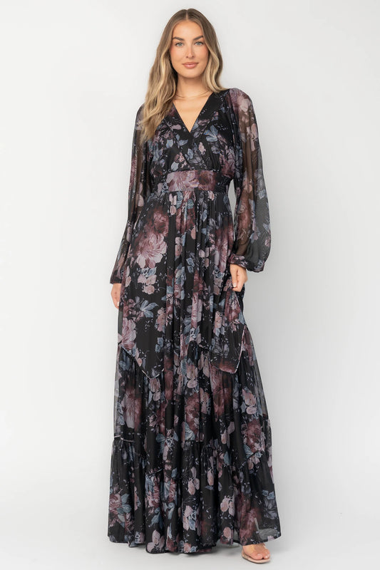 Midnight floral mesh maxi dress with sheer long sleeves, surplice V-neck, elastic waist with self-tie belt, tiered skirt, and keyhole back.