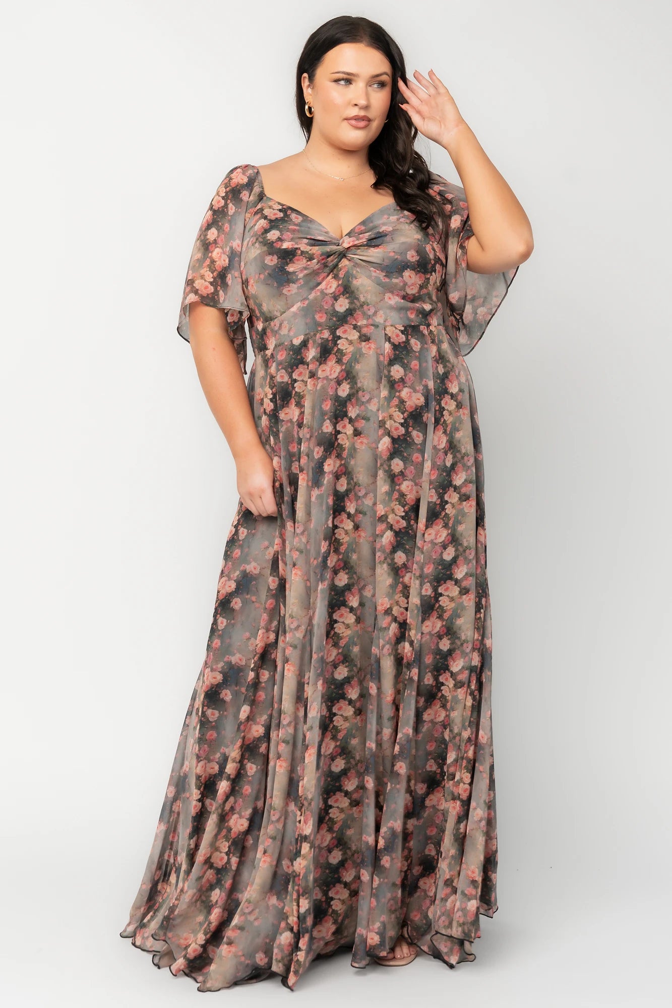 Positano Maxi Dress in Multi Floral with sweetheart neckline, flutter sleeves, smocked back, and flowy tiered skirt.