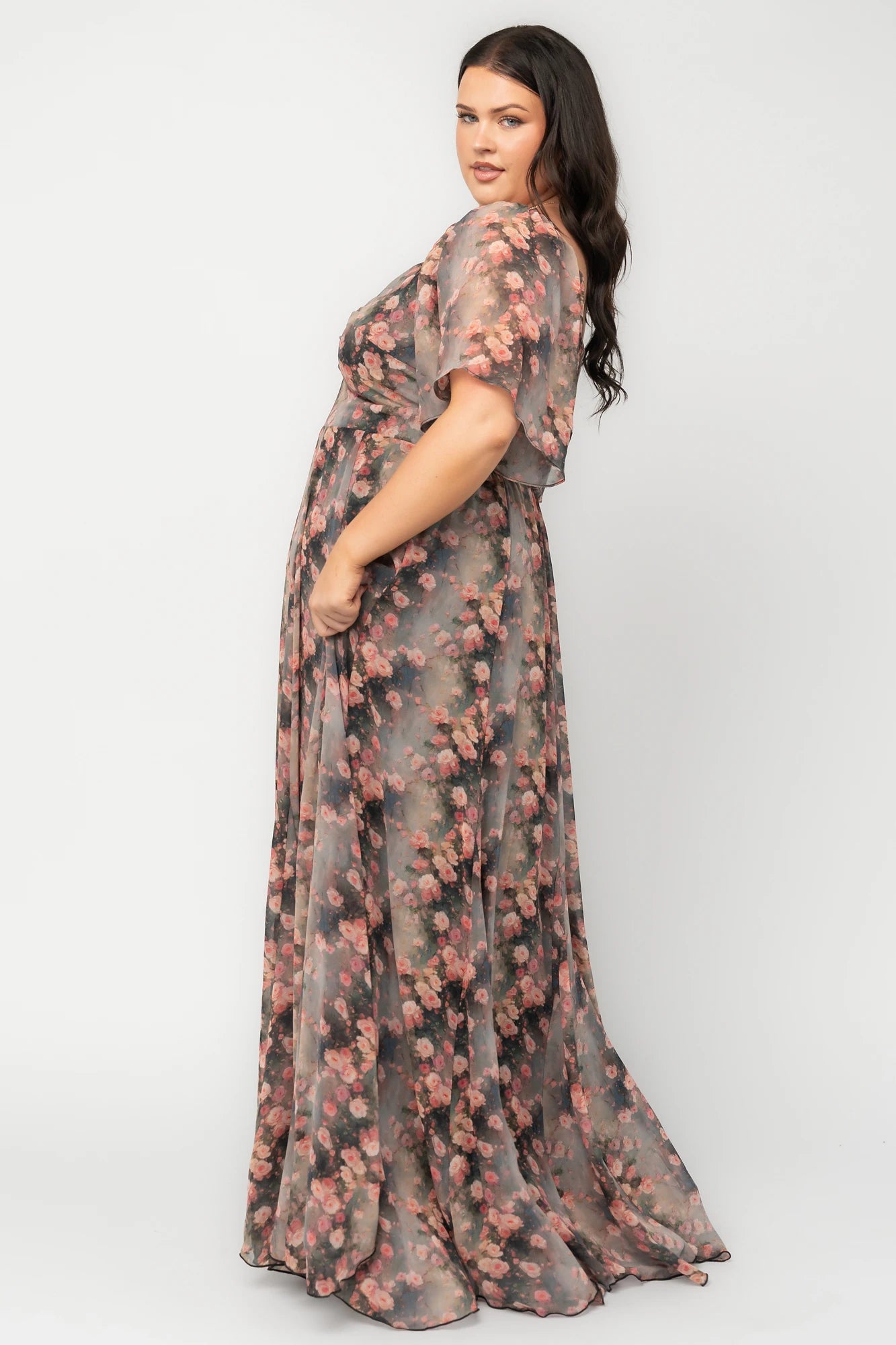 Positano Maxi Dress in Multi Floral with sweetheart neckline, flutter sleeves, smocked back, and flowy tiered skirt.