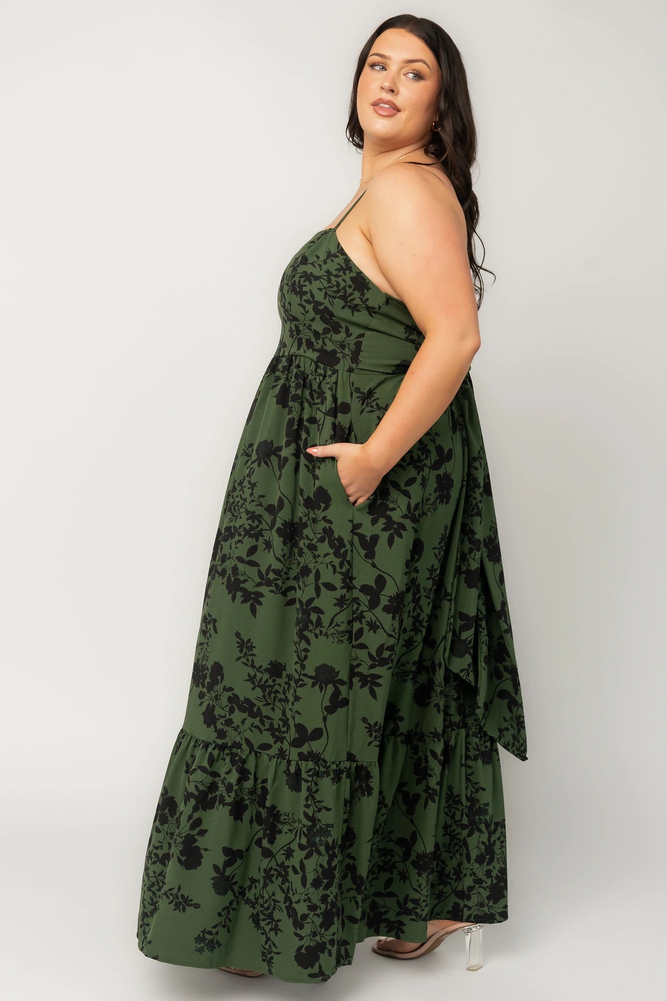 Rowan Tank Maxi Dress in Deep Olive with floral print, adjustable straps, smocked back, sash tie, and tiered skirt.