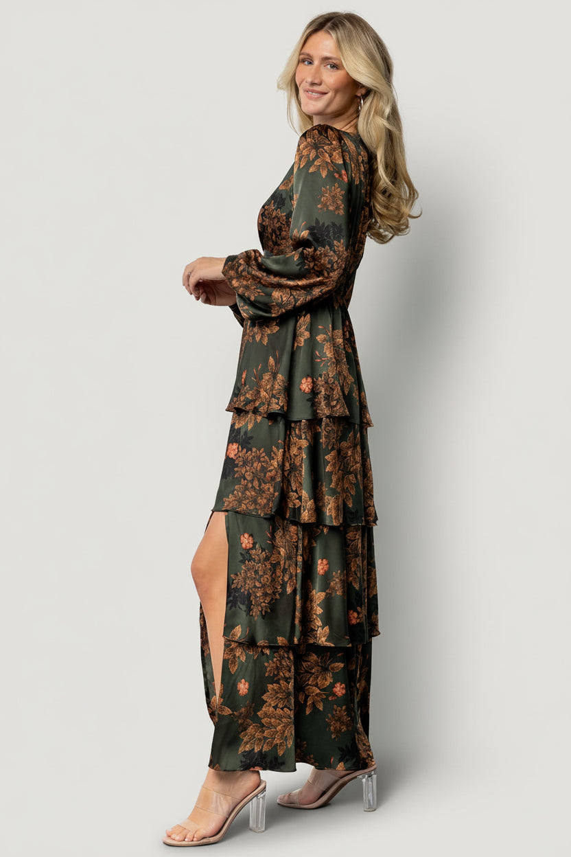 Close-up of olive floral print on satin fabric showing copper and rose floral motifs with subtle sheen and smooth drape in natural light.