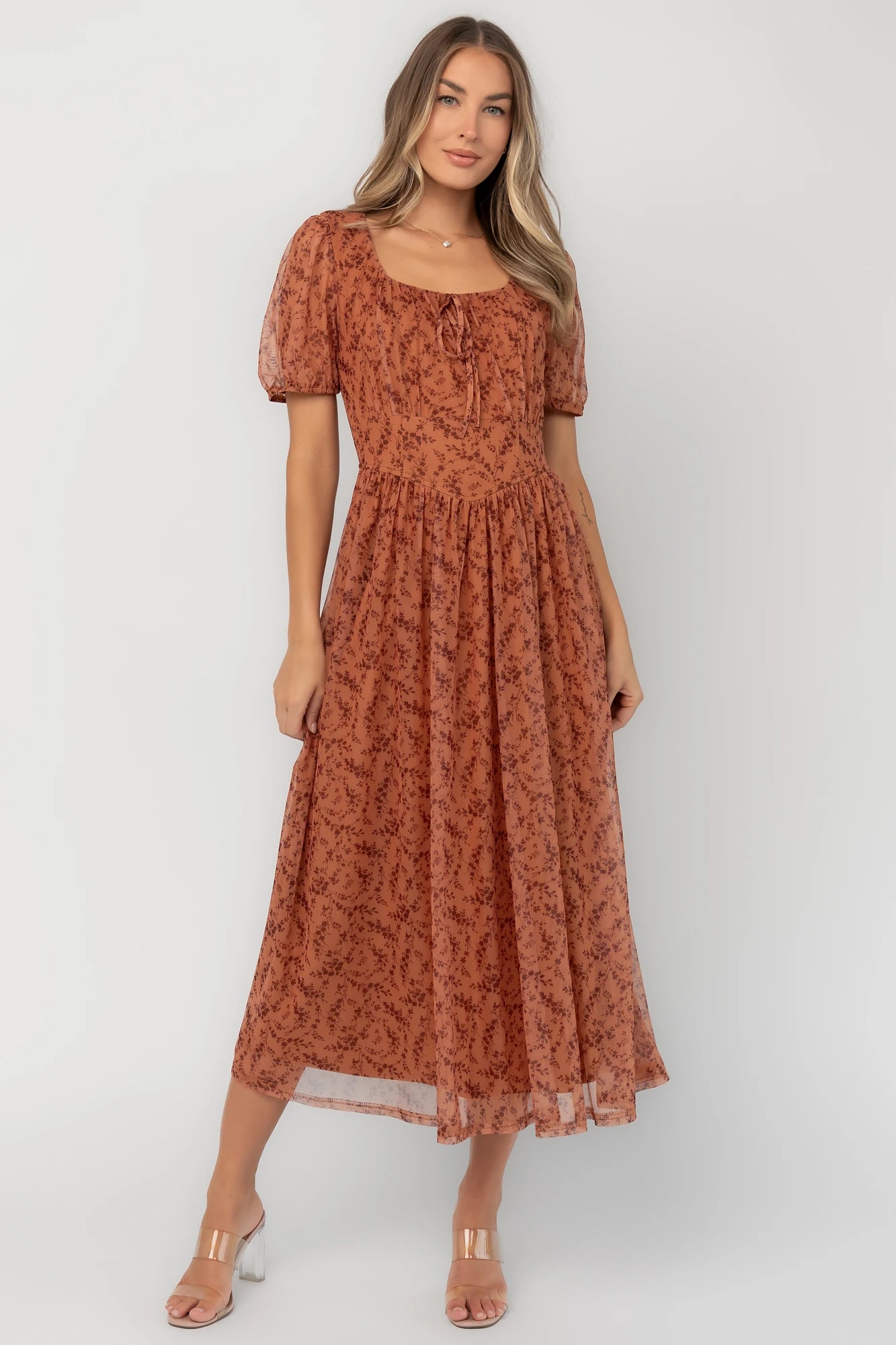 Spice floral mesh midi dress with a square neckline, short puff sleeves, fitted bodice, waist panel, and flowing midi skirt.