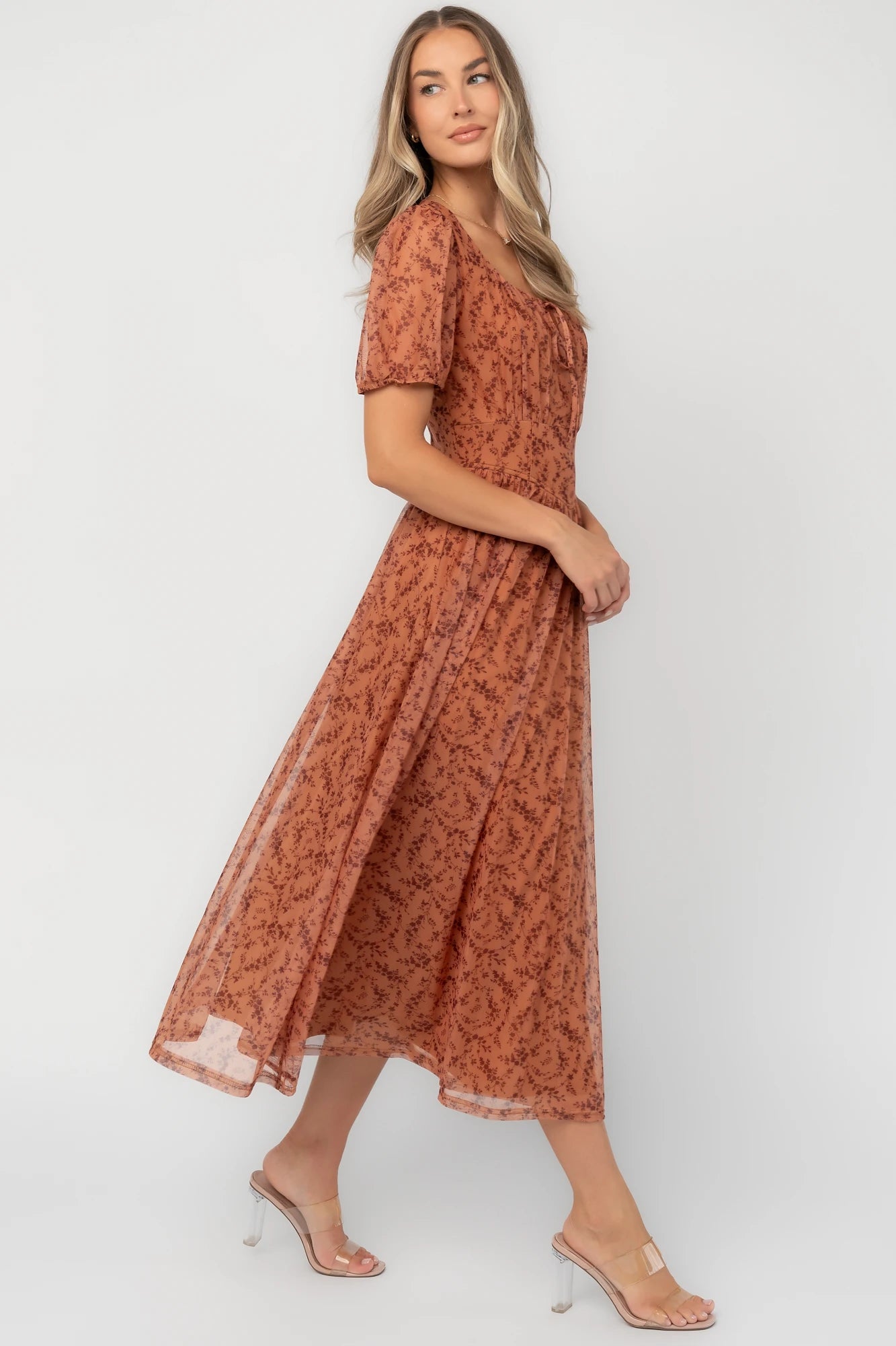 Spice floral mesh midi dress with a square neckline, short puff sleeves, fitted bodice, waist panel, and flowing midi skirt.