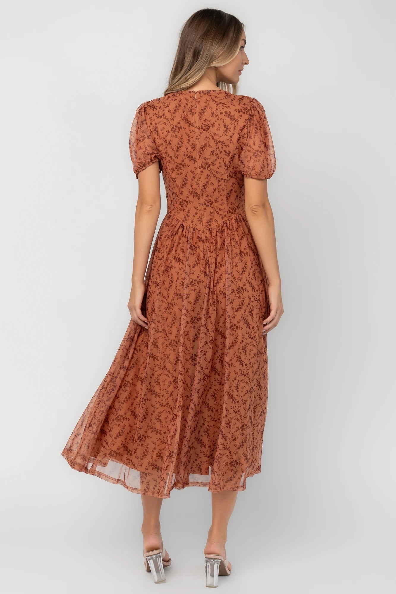 Spice floral mesh midi dress with a square neckline, short puff sleeves, fitted bodice, waist panel, and flowing midi skirt.