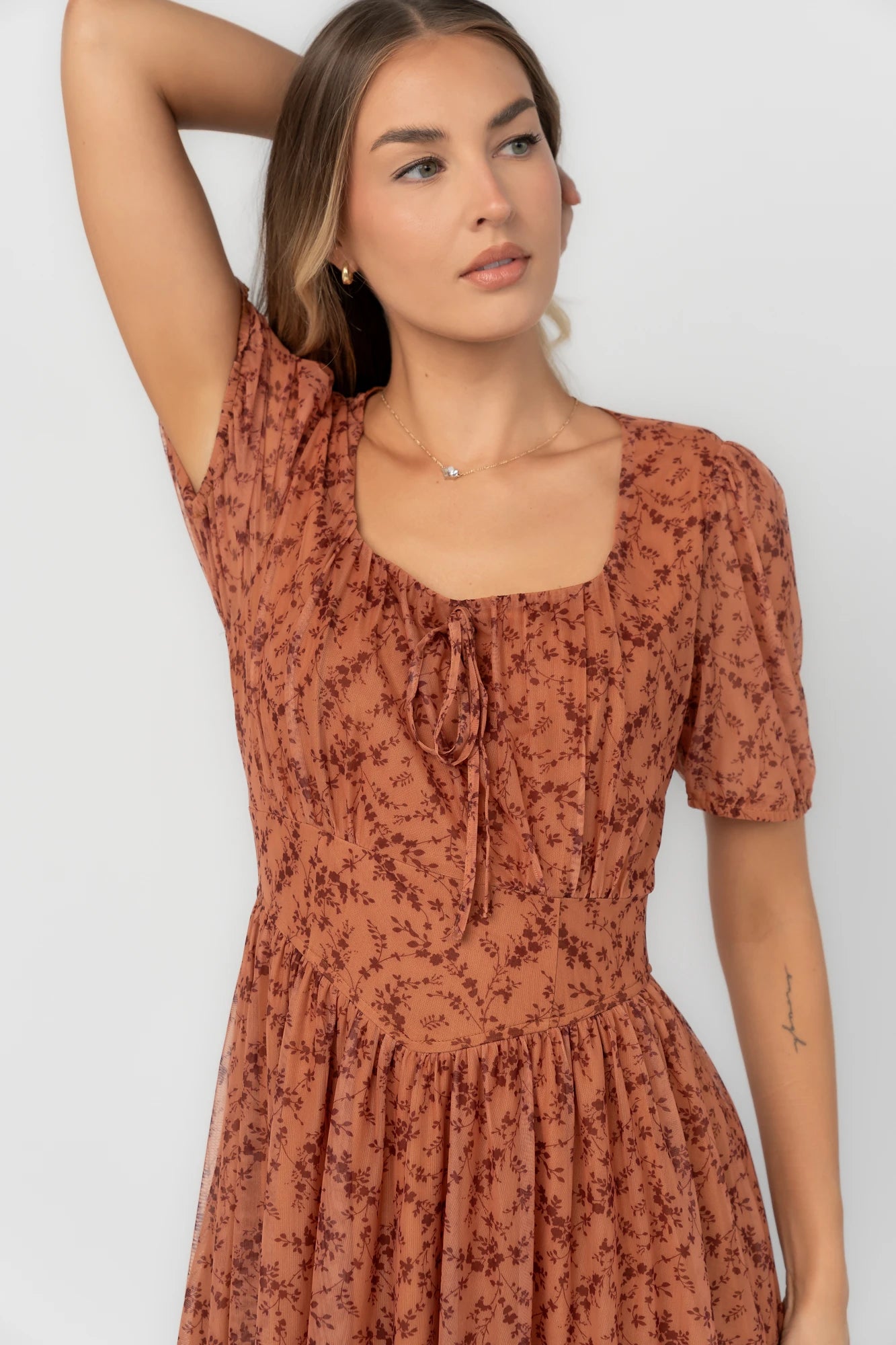 Spice floral mesh midi dress with a square neckline, short puff sleeves, fitted bodice, waist panel, and flowing midi skirt.