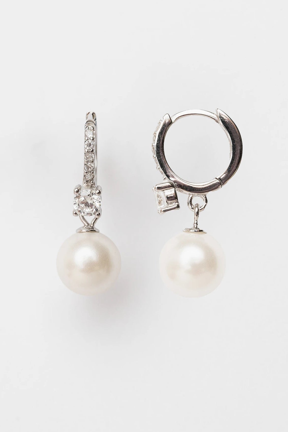 Isabella Pearl Hoop Earrings with cultured pearl accents and polished sterling silver hoops.