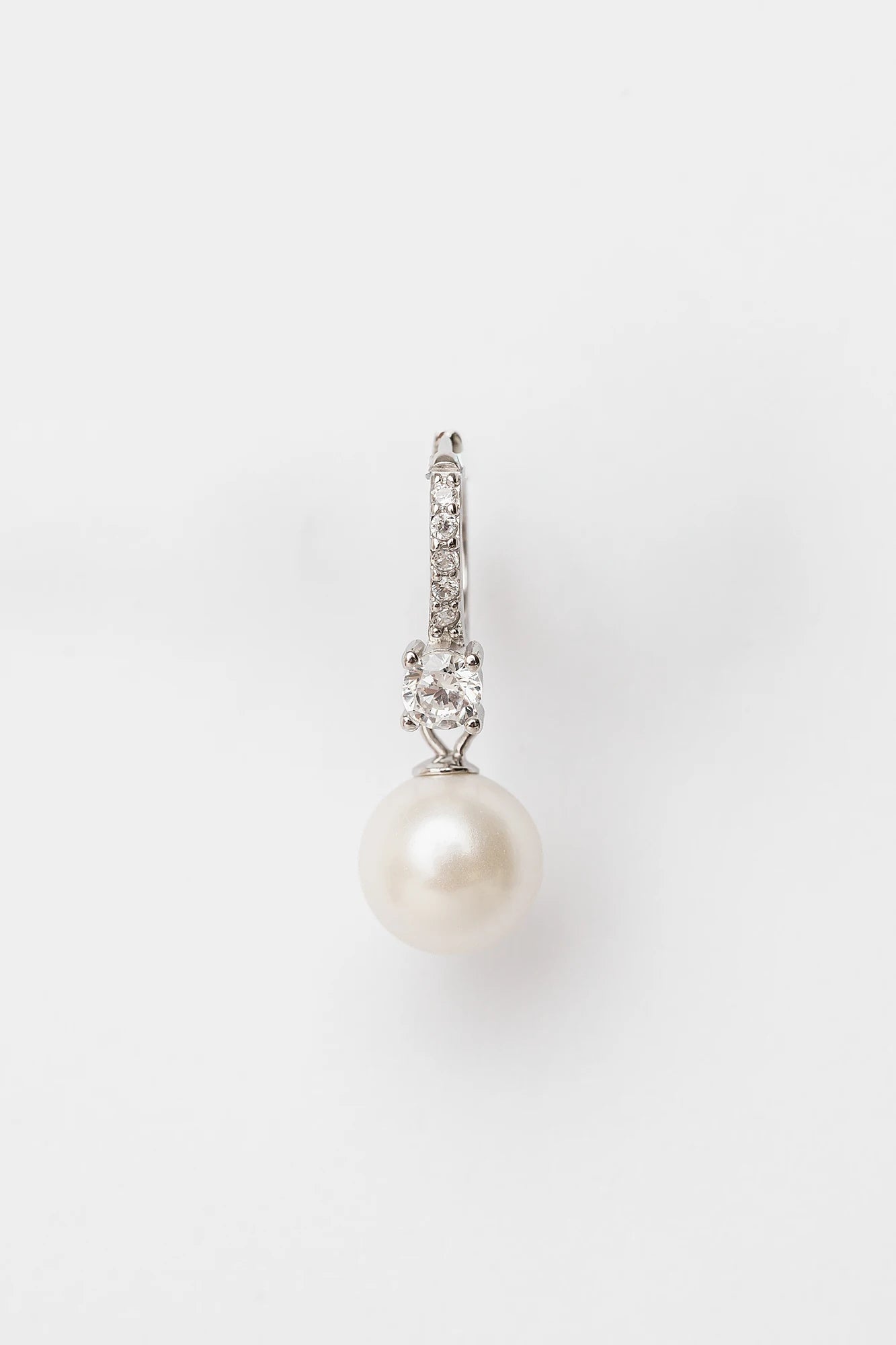 Isabella Pearl Hoop Earrings with cultured pearl accents and polished sterling silver hoops.