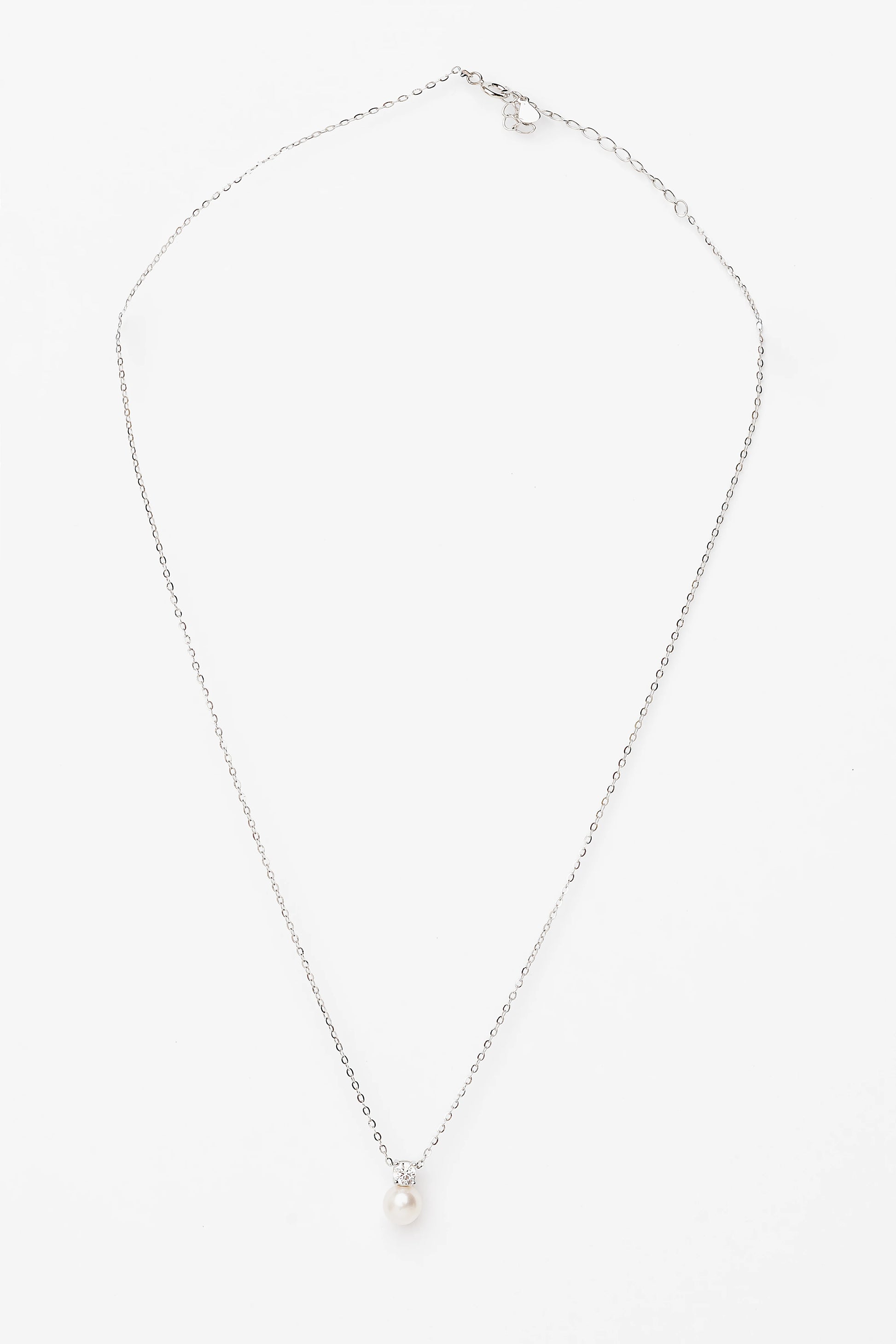 Addilyn Pearl Necklace in Silver with freshwater pearl pendant, moissanite accent, and delicate silver-tone chain.
