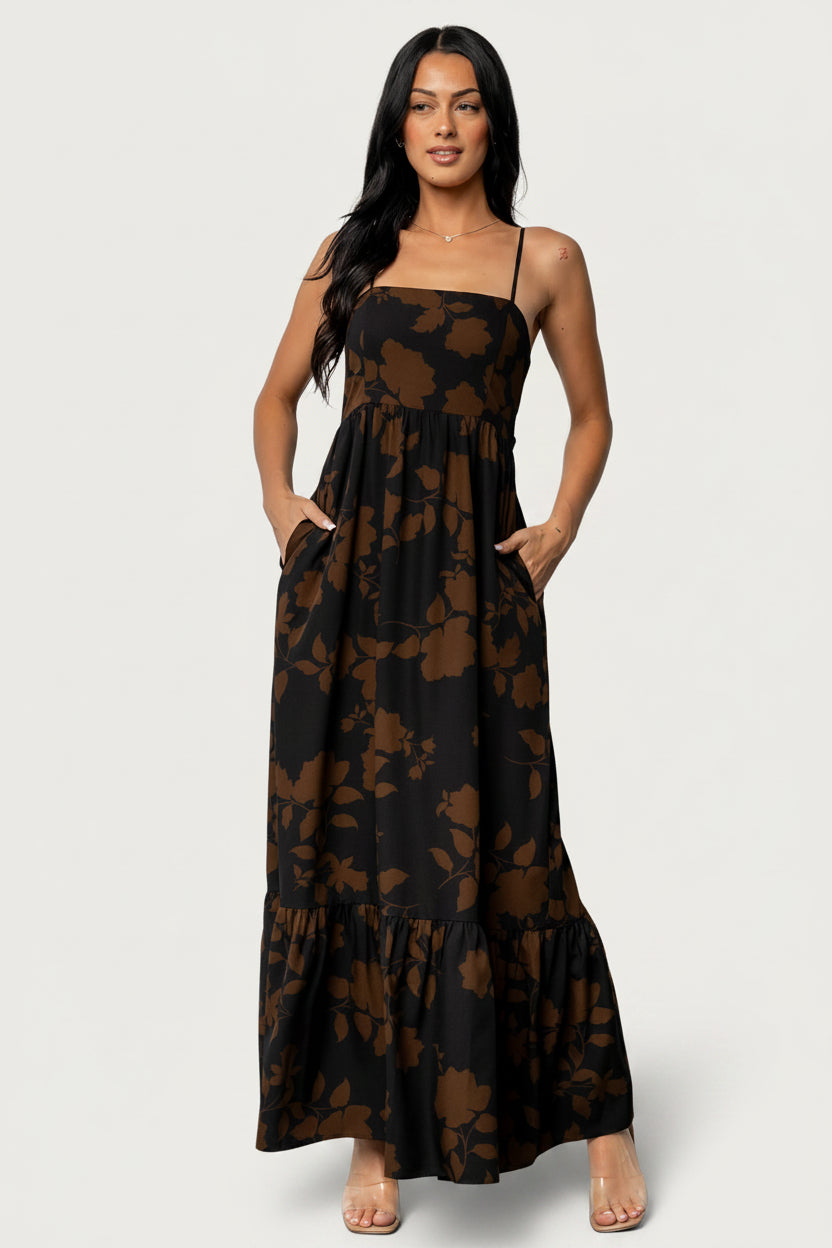 Model wears Regan Tank Maxi Dress in Espresso Print — full-length front view showing tiered chiffon skirt and side pockets.