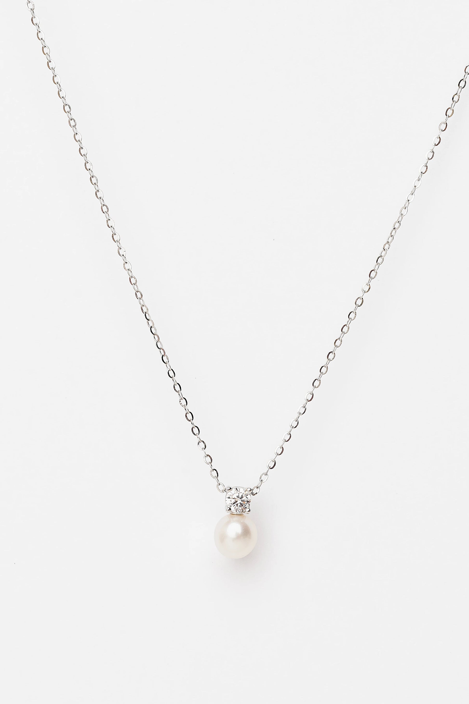 Addilyn Pearl Necklace in Silver with freshwater pearl pendant, moissanite accent, and delicate silver-tone chain.