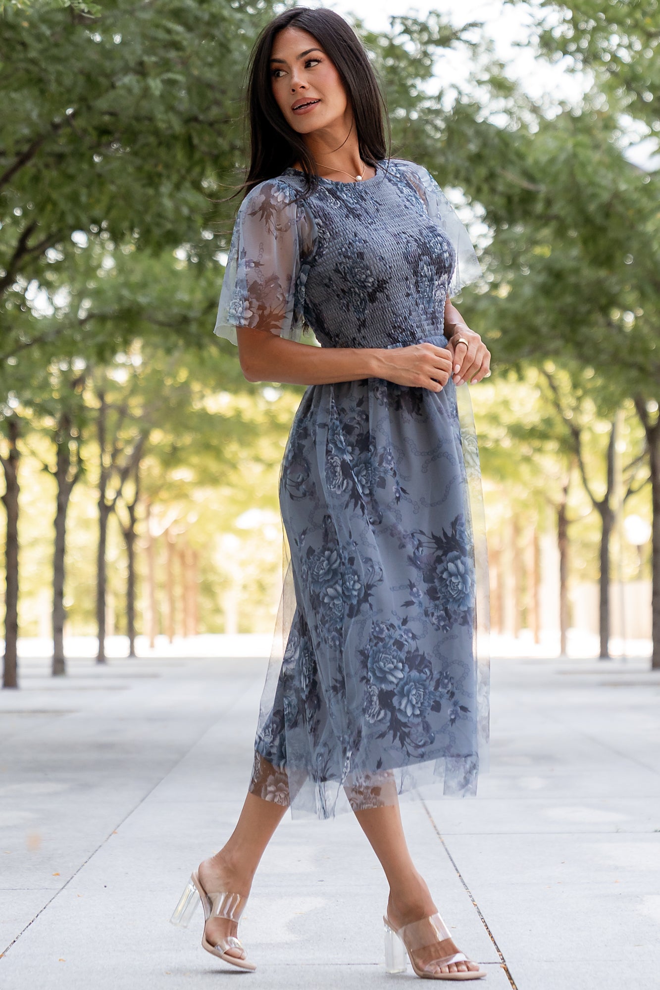 Detail shot of the smocked bodice and natural elastic waistline on the Josie Tulle Midi Dress, showing stretch and fitted shaping.