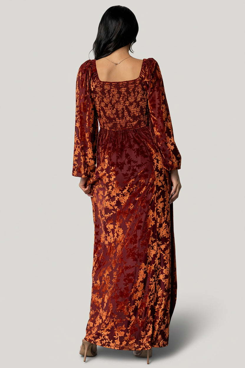 Close-up of knotted bust and horizontal seaming on the Aurora Velvet Maxi Dress showing velvet floral burnout texture and stitch detail.