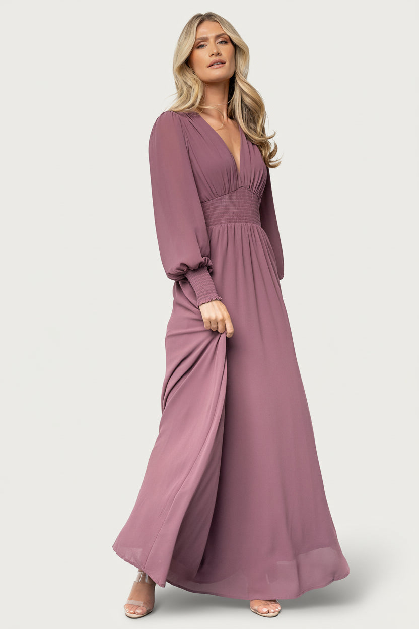 Model walking in Olivia Maxi Dress vintage plum chiffon, illustrating movement, skirt flow, and occasion-ready styling.