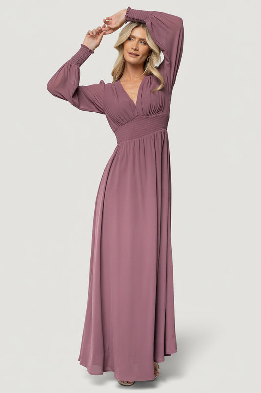 Full-length front view of Olivia Maxi Dress in vintage plum chiffon on model, showing deep V-neck and flowing skirt.