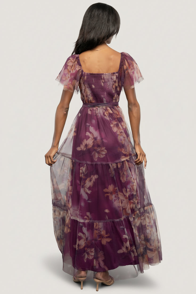 Styled detail of the waist and tie with a subtle view of how the surplice neckline sits for nursing-friendly access.