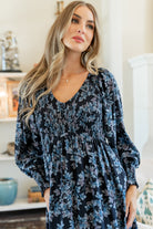 Close-up of smocked bodice and V-neckline on the Rayna Maxi Dress highlighting stretch and fine gather details.
