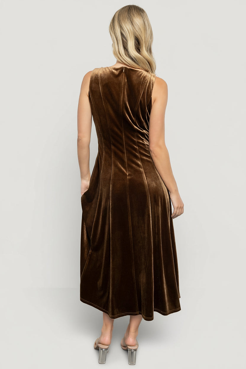 Back view of the Annika Bronze velvet midi dress featuring a discrete back zipper closure and unlined construction for lightweight wear.