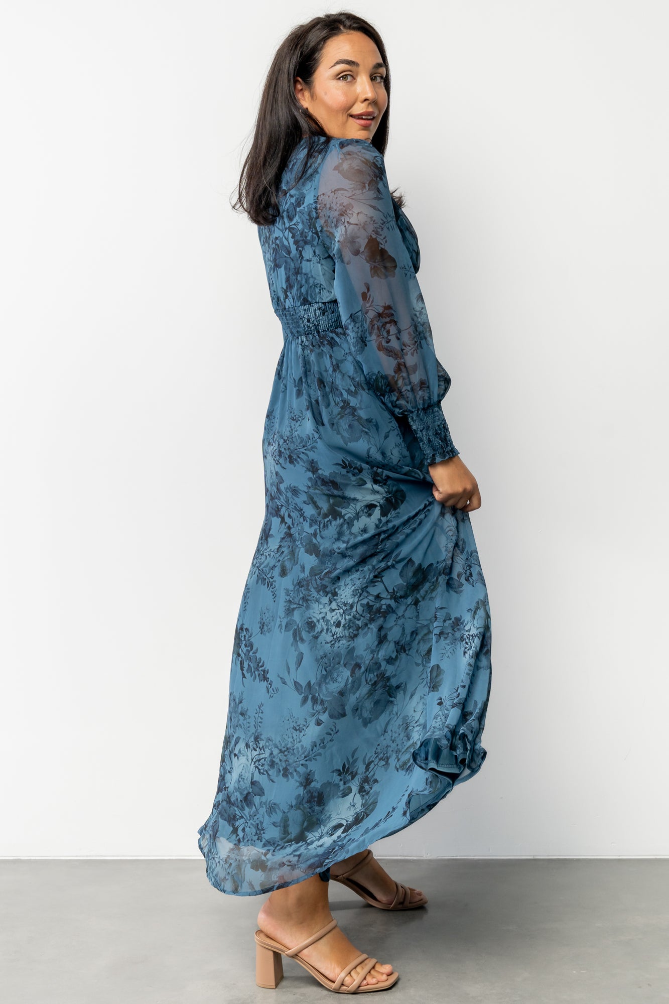 Full-length shot of the floral chiffon maxi dress on model, displaying length, print placement and hemline.