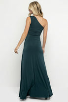 Close-up of asymmetrical gathered bodice on deep topaz Adrianna gown, showing fabric texture and diagonal ruching detail.