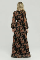 Side view of the lined maxi skirt with left leg slit, showing movement, length, and the dress's flowing silhouette.