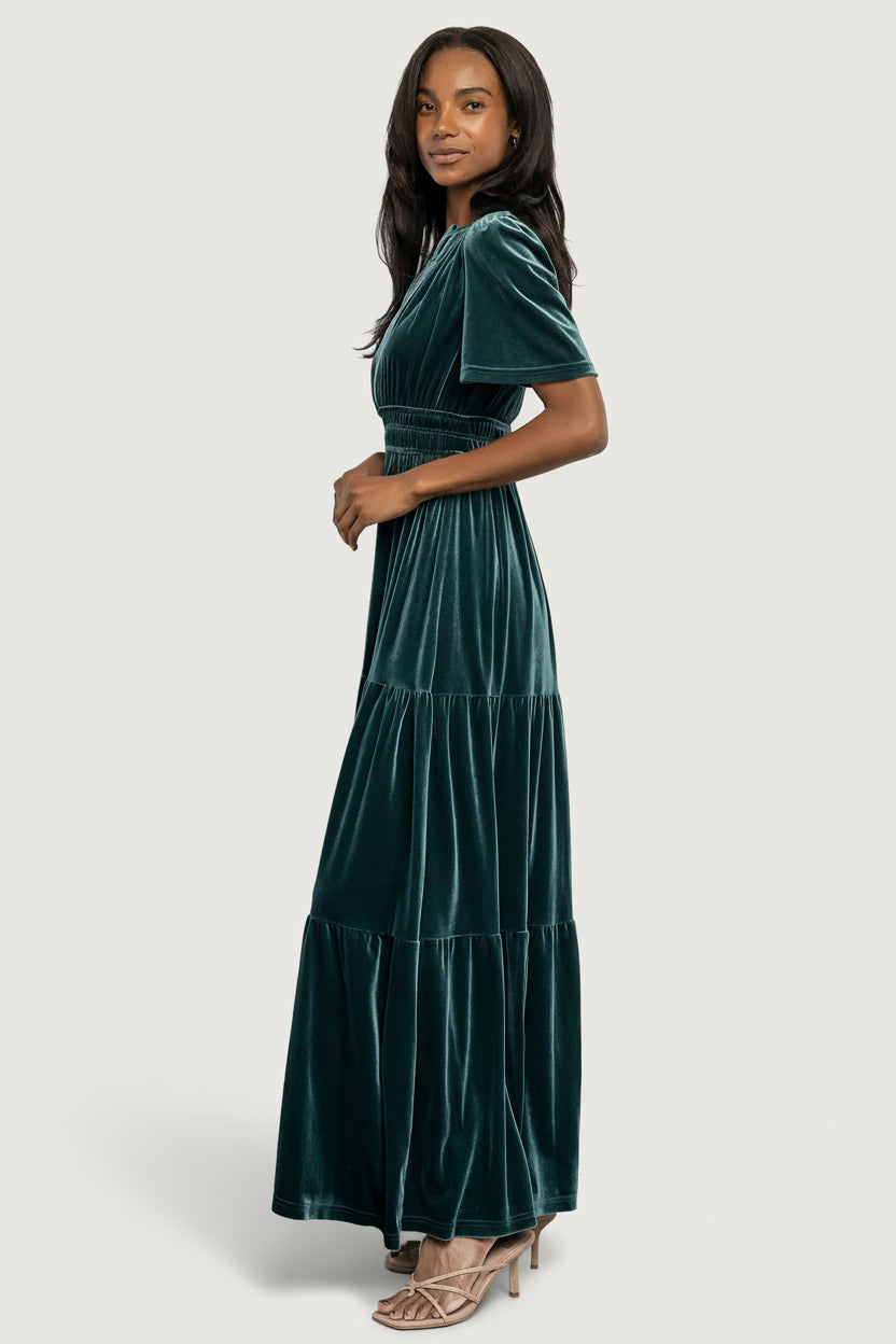 Close-up of the Artemis Deep Lagoon velvet fabric and elastic gathering at the waist, showing texture and sheen.