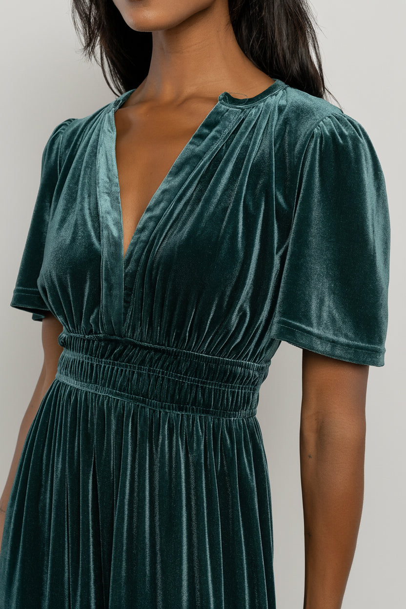 Back view of the Artemis Deep Lagoon velvet maxi dress on a model, showing full length and gentle drape of the fabric.