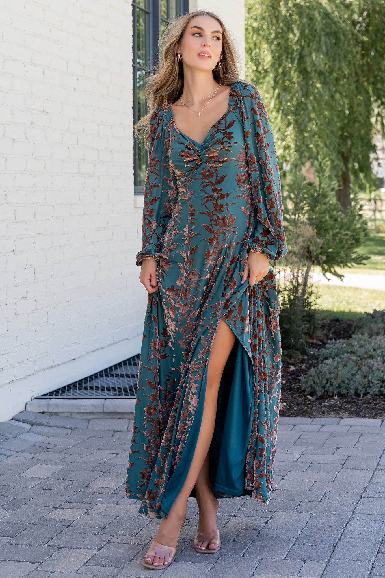 Rear view of Aurora Velvet Maxi Dress in Jade & Bronze Floral showing smocked back detail and discreet left side zipper.