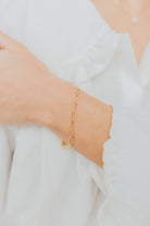 Close-up of the Eloise Link Bracelet showing elongated 18K gold-plated links and a lobster clasp on a clean white background, highlighting link detail.