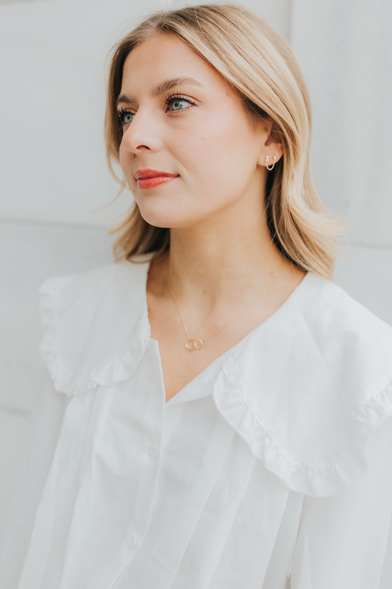 The Mia Necklace paired with matching jewelry pieces, demonstrating how the interlocking circles complement other accessories.