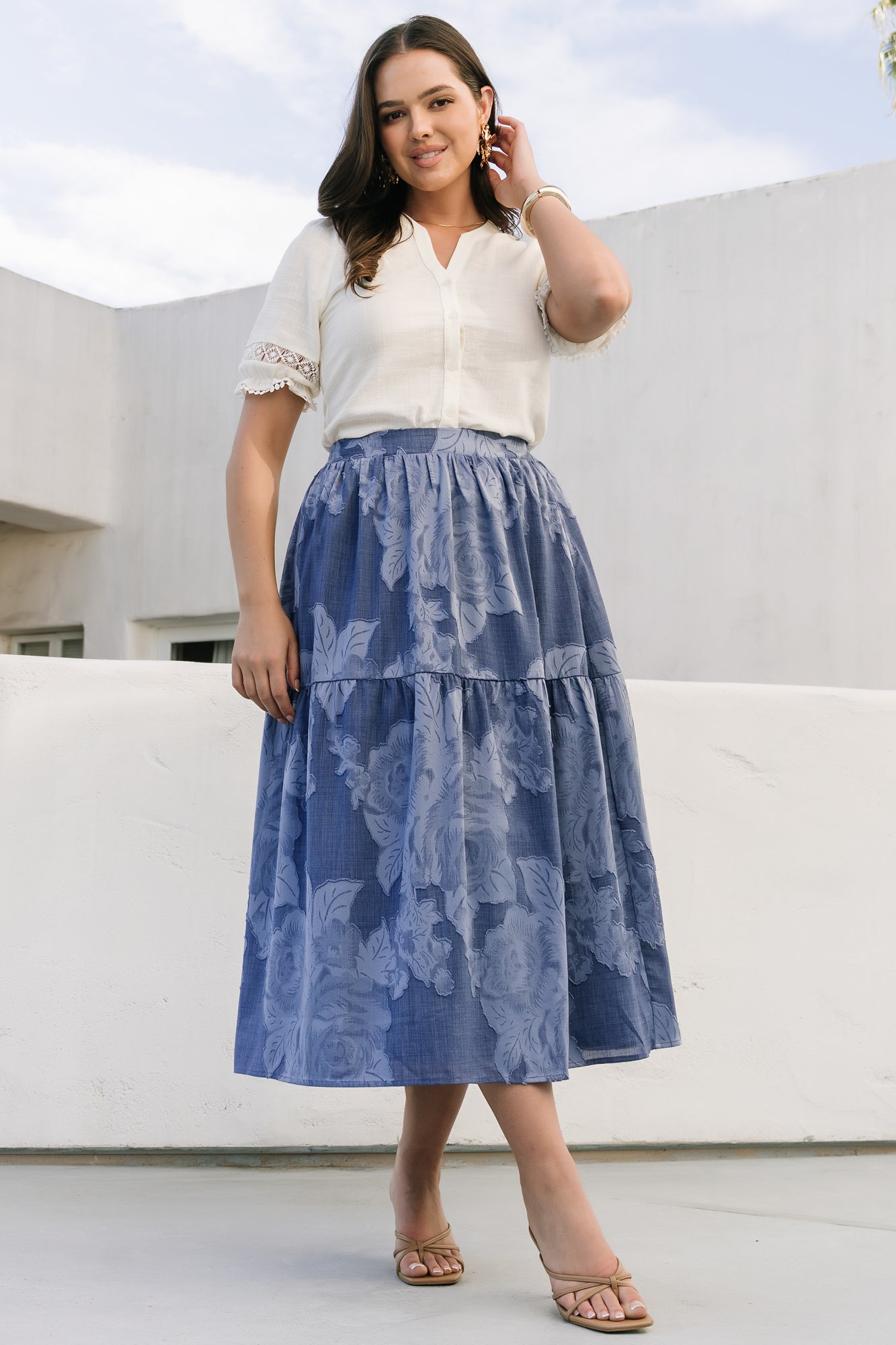 Back view of Alejandra midi skirt showing smocked waist detail and smooth, fully lined interior silhouette.