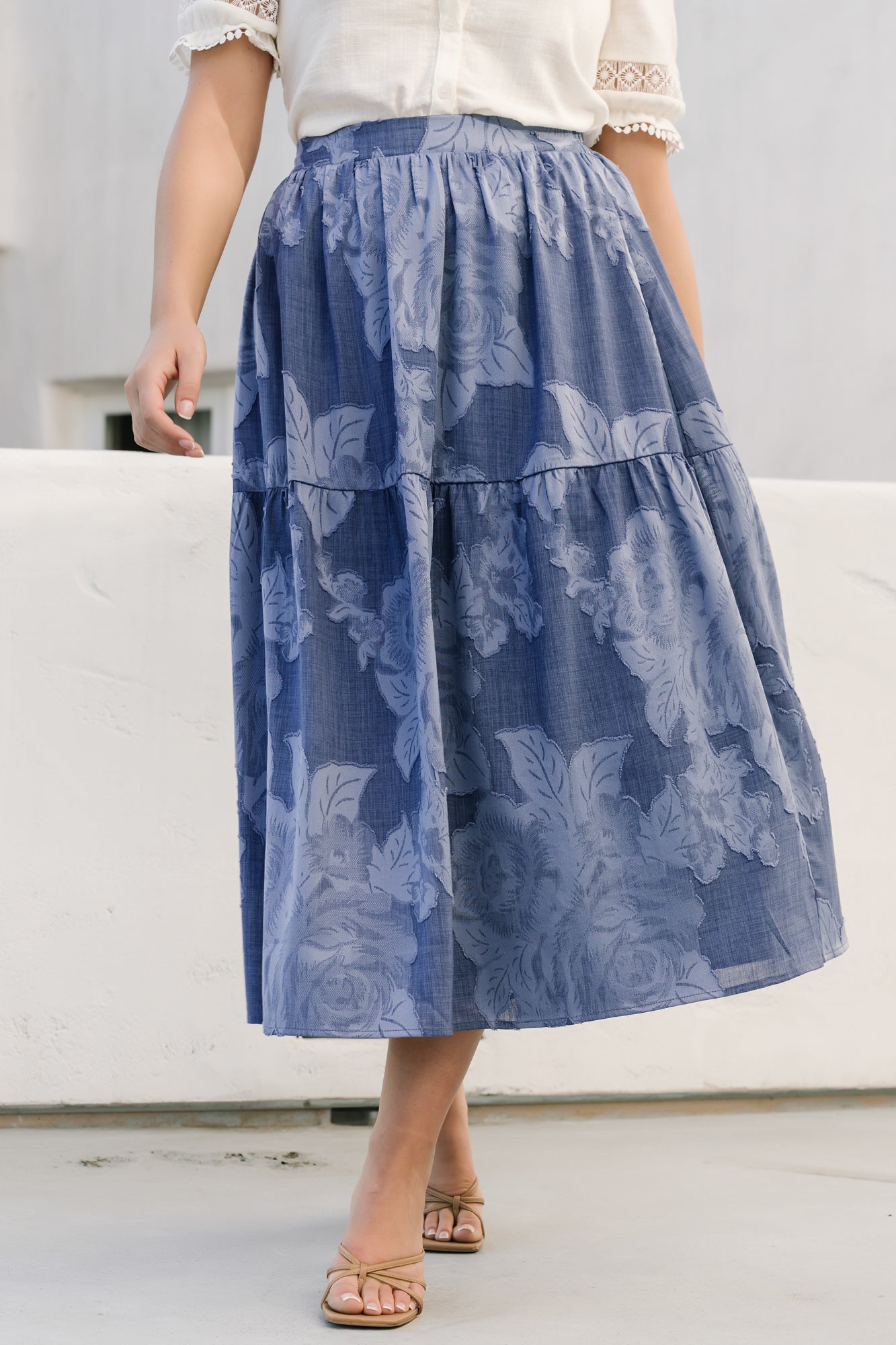Detail shot of Alejandra skirt showing side pocket opening and gentle drape of lightweight polyester lining and shell.