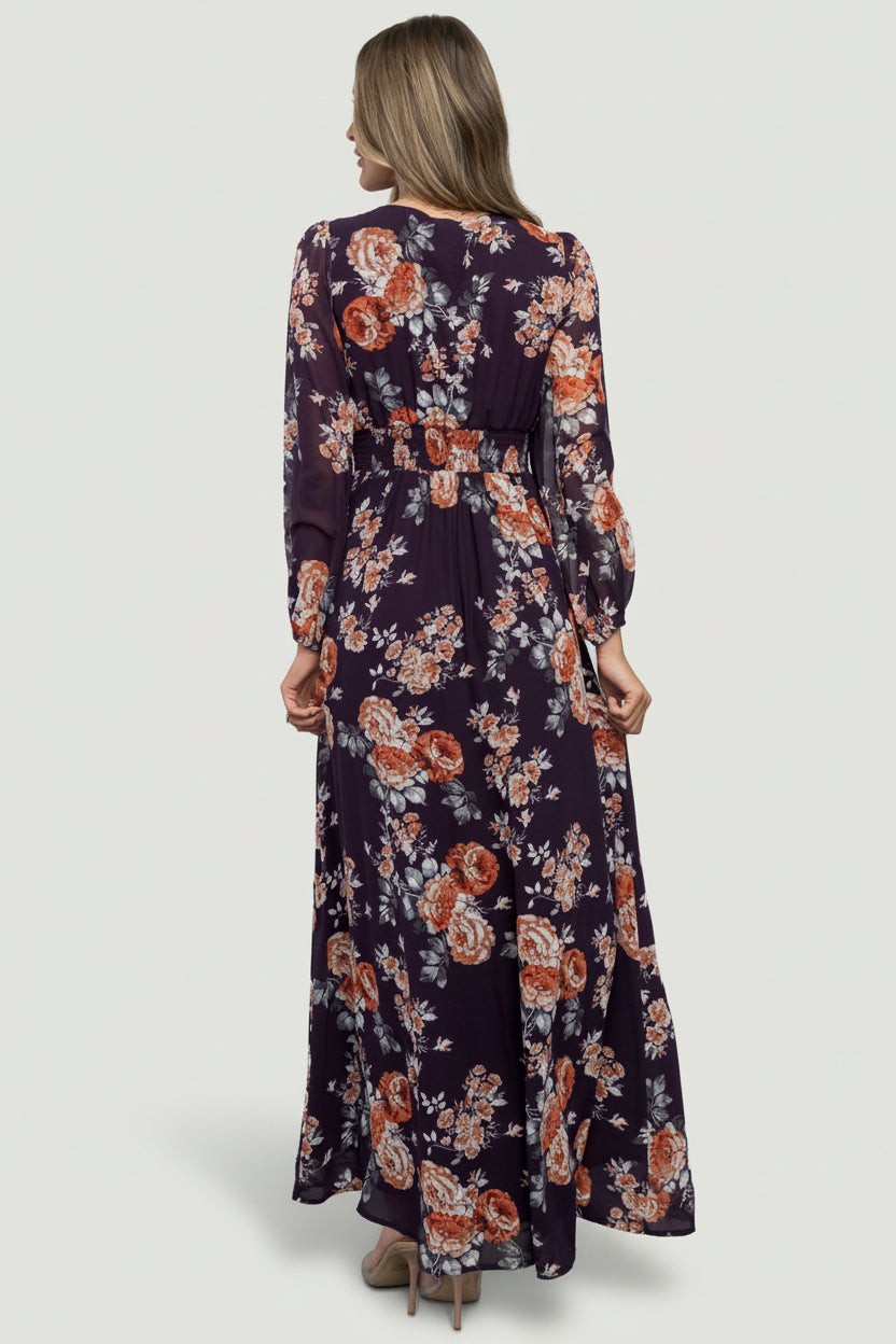 Back view of Adira maxi dress showing smocked back waist and coverage of the lined skirt, illustrating stretch and comfortable fit.