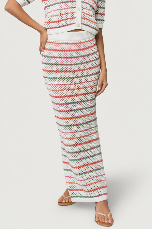 Front view of Viento crochet maxi skirt in multi-colored stripes showing mid-rise elastic waistband and relaxed pencil silhouette.