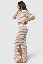 Full-length image of Viento Crochet Maxi Skirt in Multi Stripe styled with sandals to show length and fit.