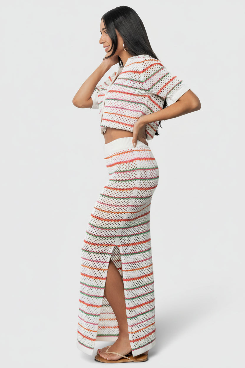 Full-length image of Viento Crochet Maxi Skirt in Multi Stripe styled with sandals to show length and fit.